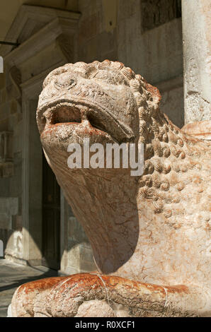 Lion sculpture supporting columns of the cathedral in Cremona, Lombardy, Italy Stock Photo