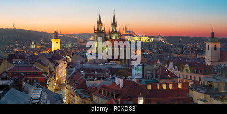 Prague - The dusk panorama of the City with the Church of Our Lady before Týn and Castle with the Cathedral in the background. dusk. Stock Photo