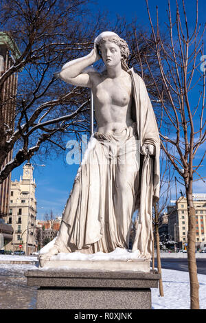 Statue known as Mariblanca with snow in Paseo de Recoletos, Madrid, Spain Stock Photo