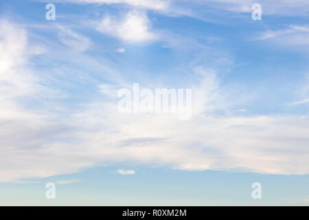 Wispy white clouds in a blue sky over the Gulf of Mexico in southwest Florida, United States Stock Photo