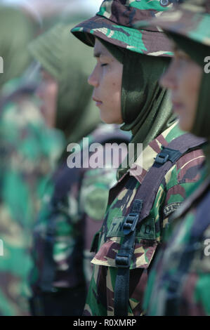 Banda Aceh, Indonesia - August 16, 2005: Indonesian women's military army corps at Indonesian Independence day celebration at Blangpadang, banda aceh Stock Photo