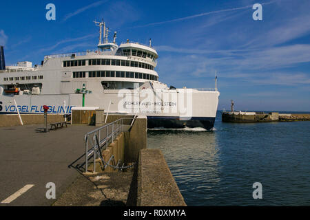 Puttgarden, Fehmarn, Germany - May 6, 2008: Great close-up view of Schleswig-Holstein, a ferry operated by Scandlines, passing through the gap of the... Stock Photo