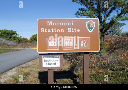 Marconi Station Site on the Cape Cod National Seashore, National Park Service, sign with restroom closed sign added in Wellfleet, Massachusetts Stock Photo