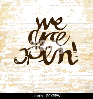 We are open lettering on wooden background. Vector illustration drawn by hand. Stock Vector