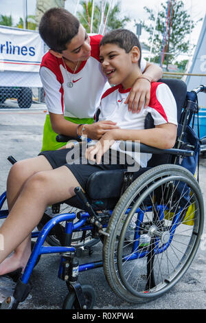 Miami Florida,Coconut Grove,Shake a Leg Miami,No Barriers Festival,disabled handicapped special needs,physical disability,brothers,family families par Stock Photo