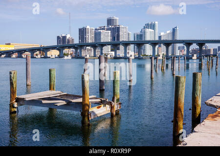 Miami Florida,Watson Island,Biscayne Bay,MacArthur Causeway,palm tree,bridge,city skyline,buildings,city skyline,condominiums,housing,high rise skyscr Stock Photo