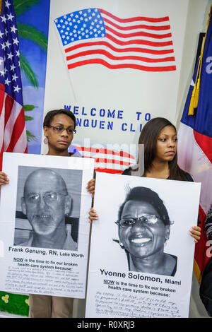 Miami Florida,Borinquen Health Care Center,clinic,healthcare reform press conference,affordable medical insurance,uninsured,Black man men male,woman f Stock Photo