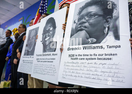 Miami Florida,Borinquen Health Care Center,clinic,healthcare reform press conference,affordable medical insurance,uninsured,Black man men male,woman f Stock Photo