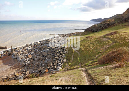 A view of sea defences and cliffs on a North Norfolk beach to the east of  Overstrand, Norfolk, England, United Kingdom, Europe. Stock Photo