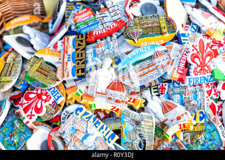 Florence, Italy - August 30, 2018: Retail display of many fridge magnets, magnet souvenir gifts from Firenze, sale at street seller Stock Photo