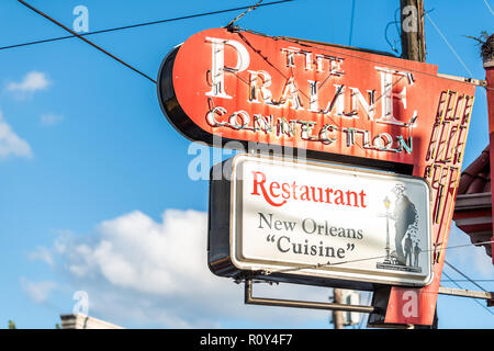 New Orleans, USA - April 22, 2018: Food business sign for Praline Connection Cuisine on street in French Quarter Frenchmen street during day in NOLA,  Stock Photo