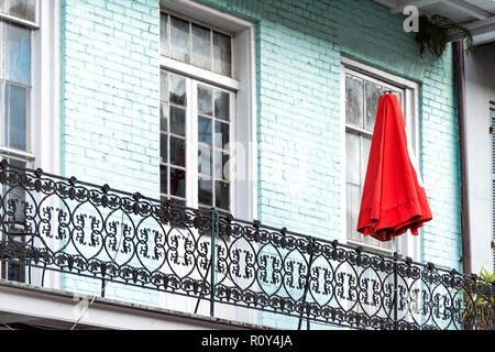 blue, red and green painted railing and painted wooden 