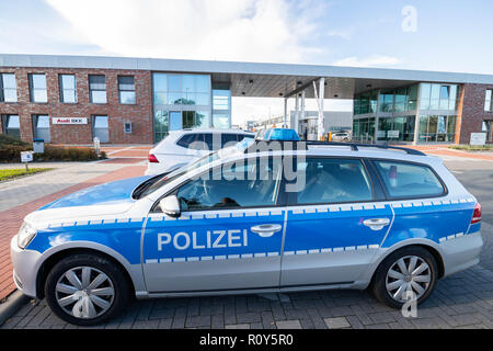 07 November 2018, Lower Saxony, Emden: A Volkswagen Passat as a police car is parked in front of the Emden VW plant. (to dpa 'VW Supervisory Board plans realignment for Emder plant') Photo: Mohssen Assanimoghaddam/dpa Stock Photo