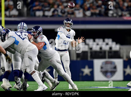 November 05, 2018:.Tennessee Titans quarterback Marcus Mariota (8)  scrambles for a first down during an NFL football game between the  Tennessee Titans and Dallas Cowboys at AT&T Stadium in Arlington, Texas.  Manny