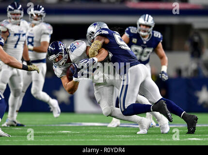 November 05, 2018:.Tennessee Titans quarterback Marcus Mariota (8)  scrambles for a first down during an NFL football game between the Tennessee  Titans and Dallas Cowboys at AT&T Stadium in Arlington, Texas. Manny