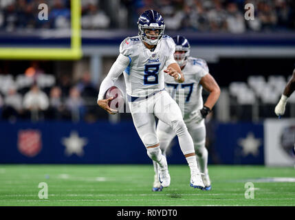 November 05, 2018:.Tennessee Titans quarterback Marcus Mariota (8)  scrambles for a first down during an NFL football game between the Tennessee  Titans and Dallas Cowboys at AT&T Stadium in Arlington, Texas. Manny