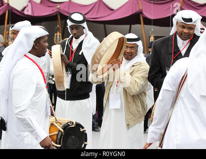 Paris, France. 5th Oct, 2014. Qatari men are seen performing their dance and music during the Qatar Prix de l'Arc de Triomphe event at the Longchamp racecourse Credit: Osama Faisal/SOPA Images/ZUMA Wire/Alamy Live News Stock Photo
