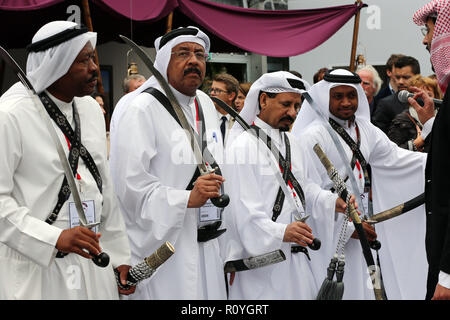 Paris, France. 5th Oct, 2014. Qatari men are seen performing their dance and music during the Qatar Prix de l'Arc de Triomphe event at the Longchamp racecourse. Credit: Osama Faisal/SOPA Images/ZUMA Wire/Alamy Live News Stock Photo