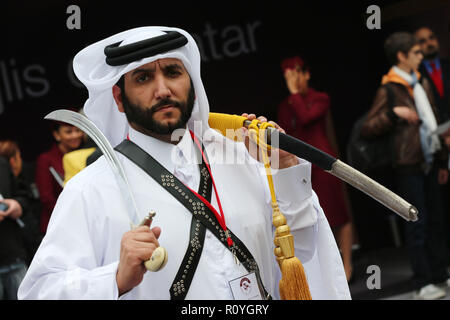 Paris, France. 5th Oct, 2014. Qatari man seen performing during the Qatar Prix de l'Arc de Triomphe event at the Longchamp racecourse. Credit: Osama Faisal/SOPA Images/ZUMA Wire/Alamy Live News Stock Photo