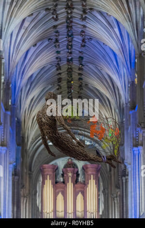 Norwich, UK. 7th November, 2018. The wicker sensing angel hangs from the ceiling above the service - Evensong attended by the Archbishop of Canterbury and the Bishop of Norwich, on the theme of reconciliation, in Norwich Cathedral. Credit: Guy Bell/Alamy Live News Stock Photo