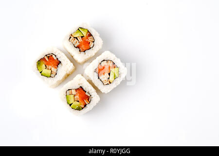 Original Japanese dish rolls with seafood, ginger and wasabi isolated on black background Stock Photo