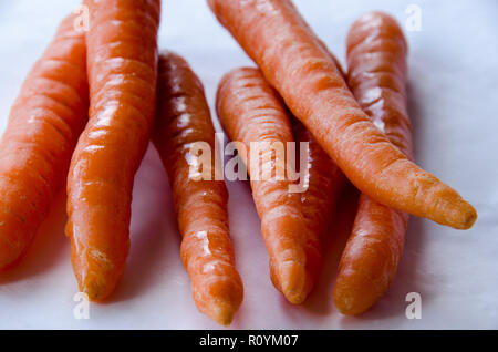Carrots in group on white background Stock Photo
