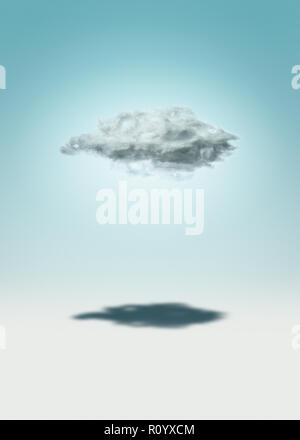 Shadow under low cloud against graduated blue sky background Stock Photo