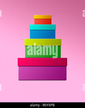 Stack of colourful gift boxes against pink background, still life Stock Photo