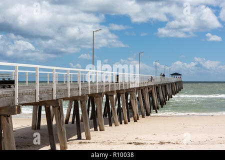 The grange jetty with a blue sky and white fluffy clouds at Grange South Australia on 7th November 2018 Stock Photo