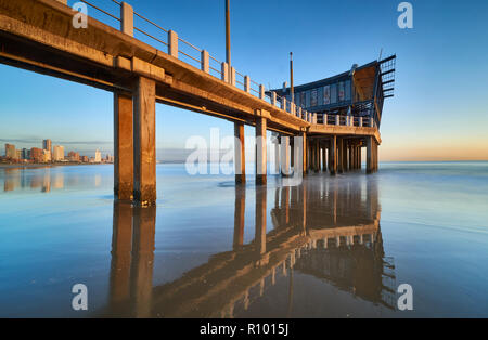 Watch the world go by at The Pier at Moyo uShaka, a unique Durban destination. Early morning. Durban, Kwazulu Natal, South Africa Stock Photo