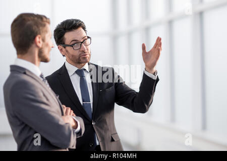 business partners discussing working prospects Stock Photo