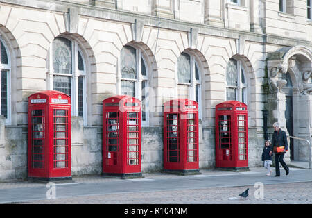 Row of four old style K2 phone boxes outside old General Post Office and Sorting office building in Abingdon street Blackpool Lancashire England UK Stock Photo