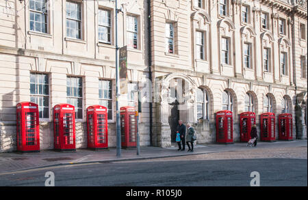 Row of eight old style K2 phone boxes outside old General Post Office and Sorting office building in Abingdon street Blackpool Lancashire England UK Stock Photo