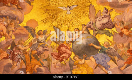 PRAGUE, CZECH REPUBLIC - OCTOBER 18, 2018: The baroque fresco of Angels with the Holy Spirit in church kostel Svaté Voršily Stock Photo