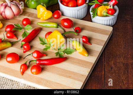 mix of peppers with tomato, garlic and olive oil. Stock Photo