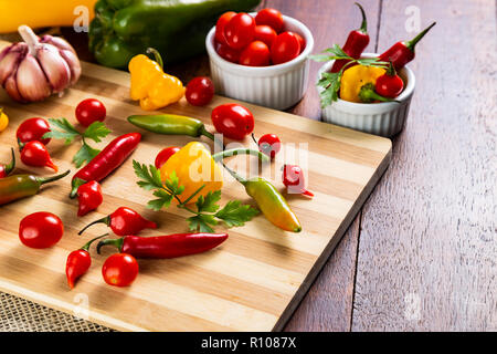 mix of peppers with tomato, garlic and olive oil. Stock Photo