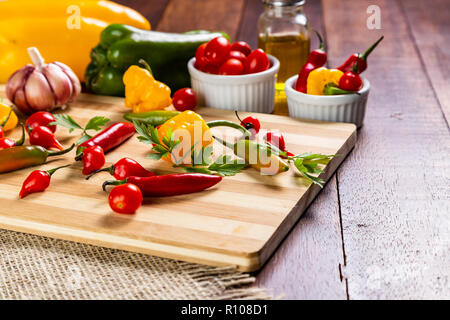 mix of peppers with tomato, garlic and olive oil. Stock Photo