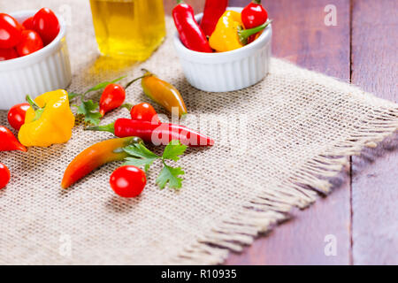 mix of peppers with tomato, garlic and olive oil. Stock Photo