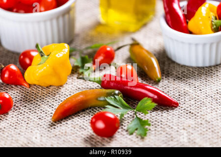 mix of peppers with tomato, garlic and olive oil. Stock Photo