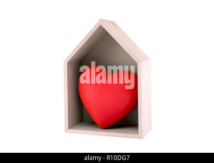 Wooden house with red heart isolated on white with clipping path Stock Photo