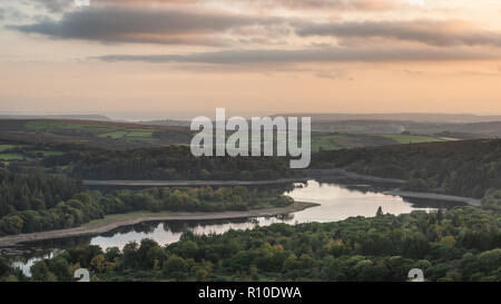 Beautiful Autumn sunset landscape image of view from Leather Tor towards Burrator Reservoir in Dartmoor National Park Stock Photo