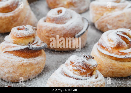 Modern fashionable pastries - scones cruffins (puffmaffin), a mixture of a croissant and maffin Stock Photo