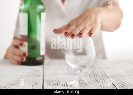 Woman refuses to drink alcohol Stock Photo