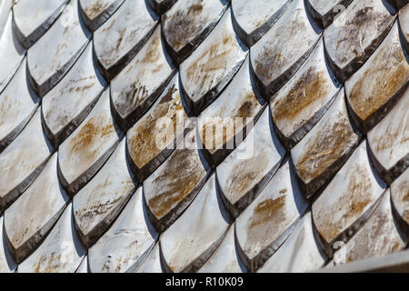 Close up fragment of tiled roof. Selective focus. Stock Photo