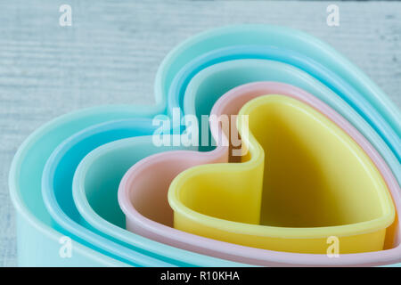 Heart shaped cookie cutter on white background Stock Photo