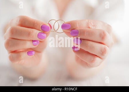 Showing wedding rings. Love theme Stock Photo