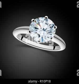 Close up of a silver diamond ring against a dark background Stock Photo