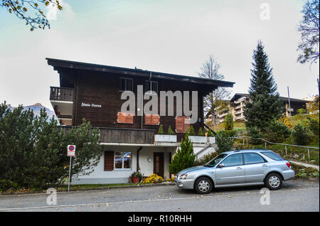 Grindelwald, Switzerland - Oct 21, 2018. Mountain village in Grindelwald, Switzerland. Grindelwald was one of the first tourist resorts in Europe. Stock Photo