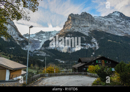 Grindelwald, Switzerland - Oct 21, 2018. Mountain village in Grindelwald, Switzerland. Grindelwald was one of the first tourist resorts in Europe. Stock Photo