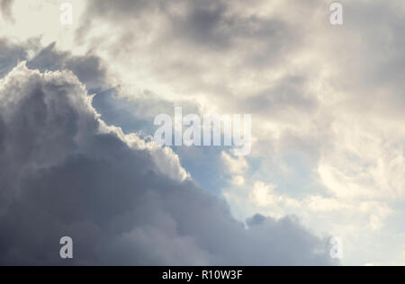 Nice sky with black and clear clouds with blue sky background Stock Photo